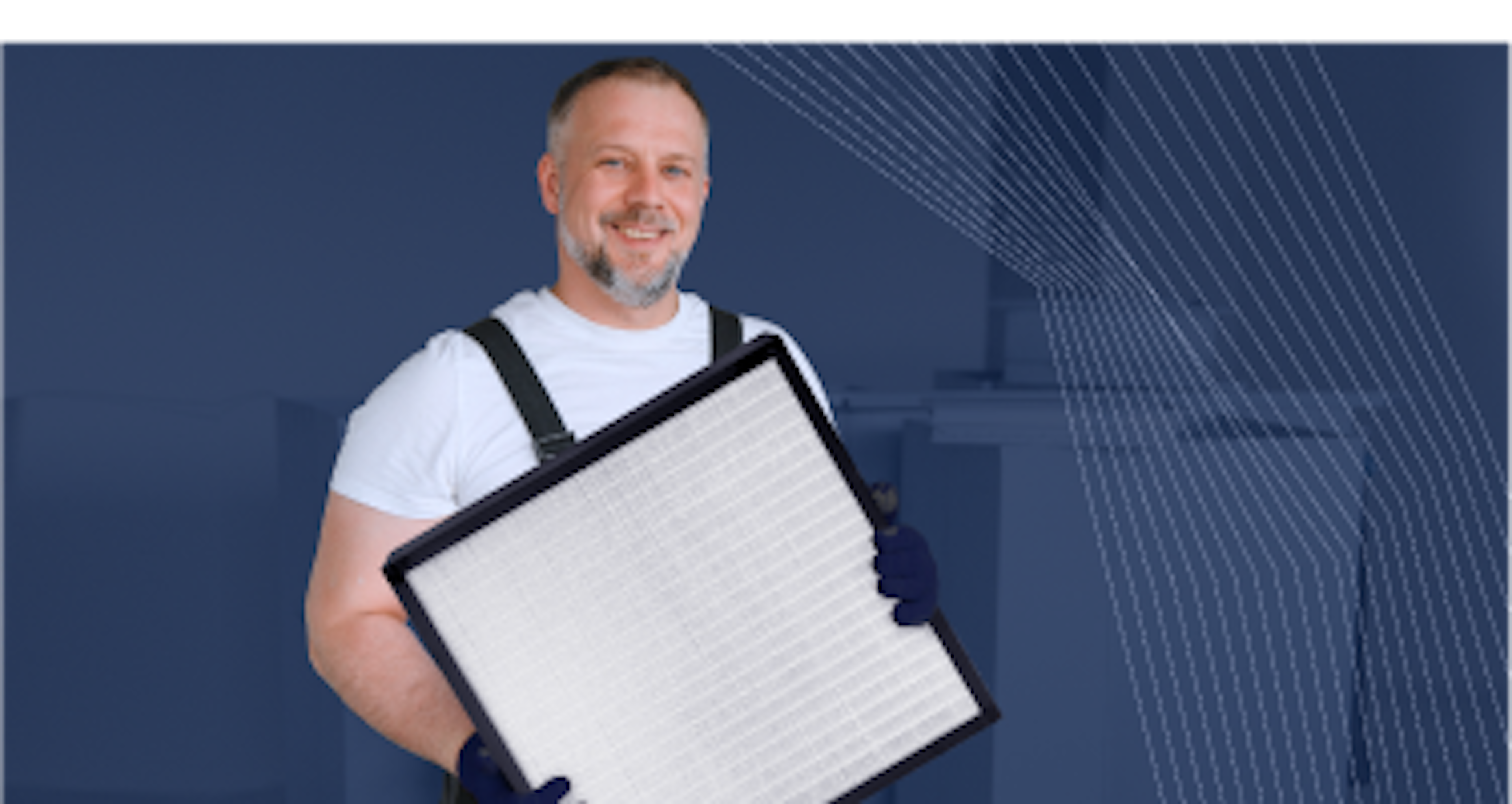 A man wearing a white t-shirt and overalls holds a large rectangular filter against a background with geometric lines.